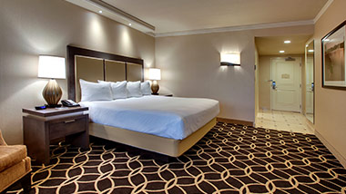 hotel room with king bed