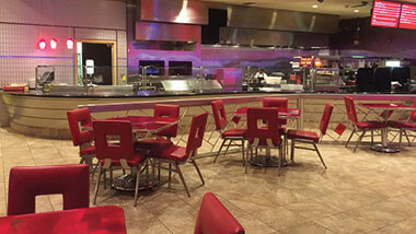 Red seats and tables inside Celebrity Grill at Hollywood Casino in St. Louis, Missouri.