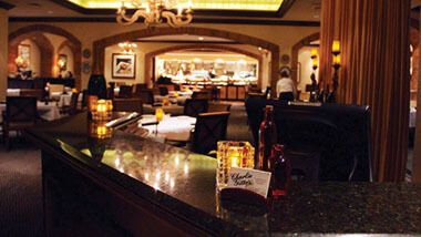 The wooden bar and dining room inside Charlie Gitto's Hollywood Casino in St. Louis, Missouri.
