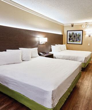 Two queen beds inside the Sunset Queen hotel room at Hollywood Casino in St. Louis, Missouri.