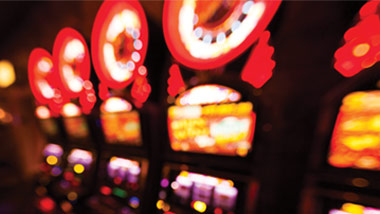 blurred row of slot machines
